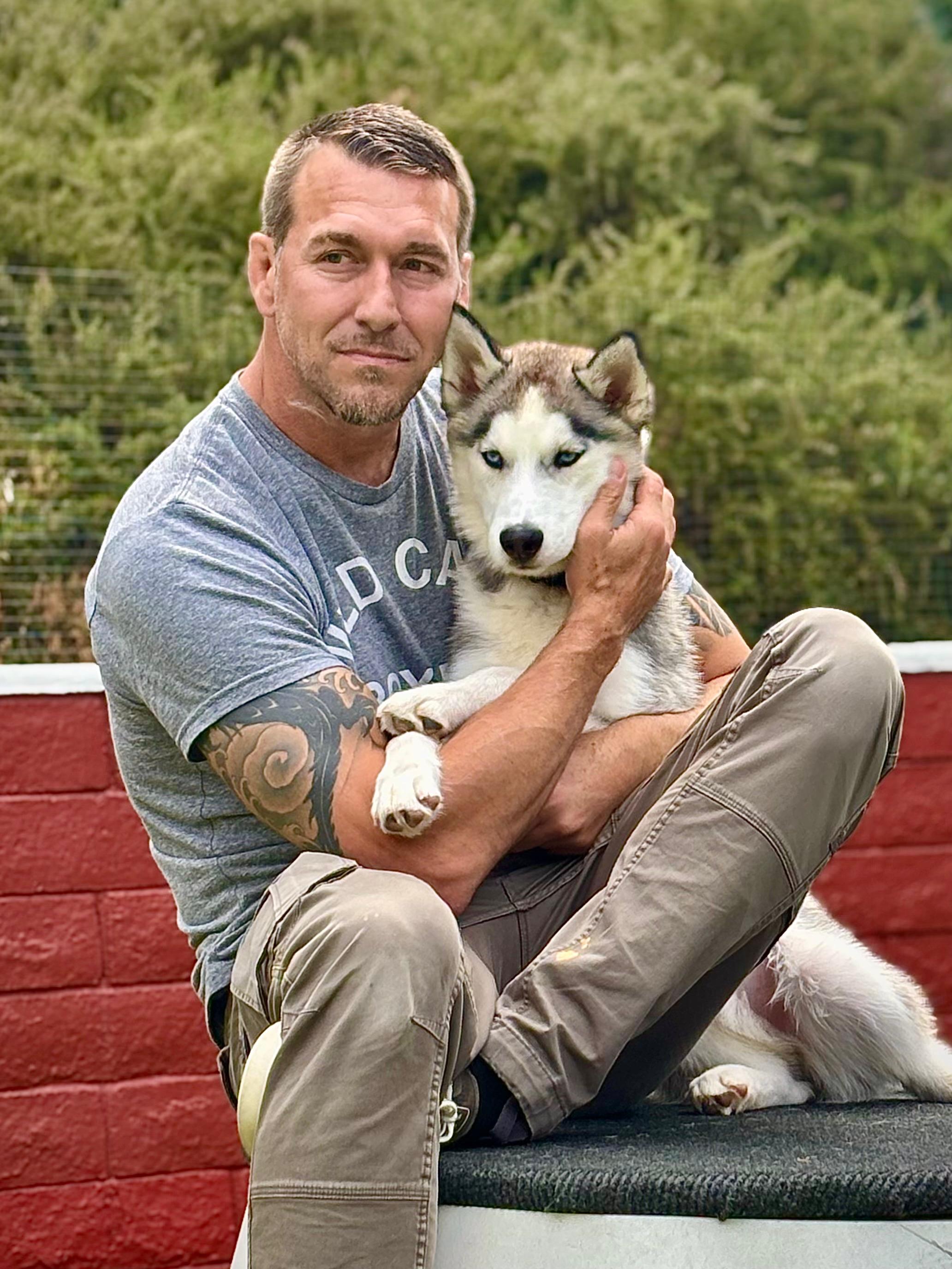 Brandon with husky