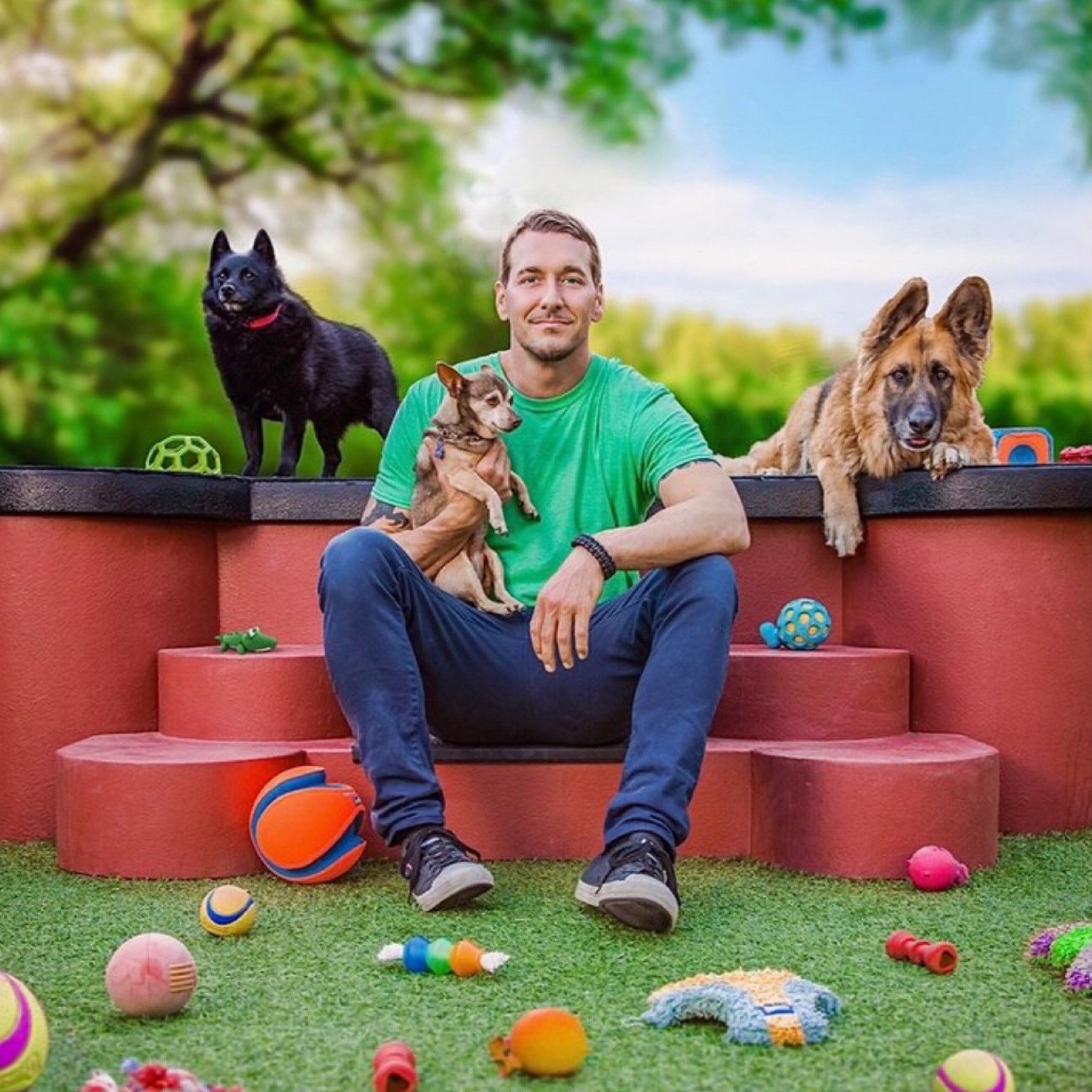 Brandon with three dogs