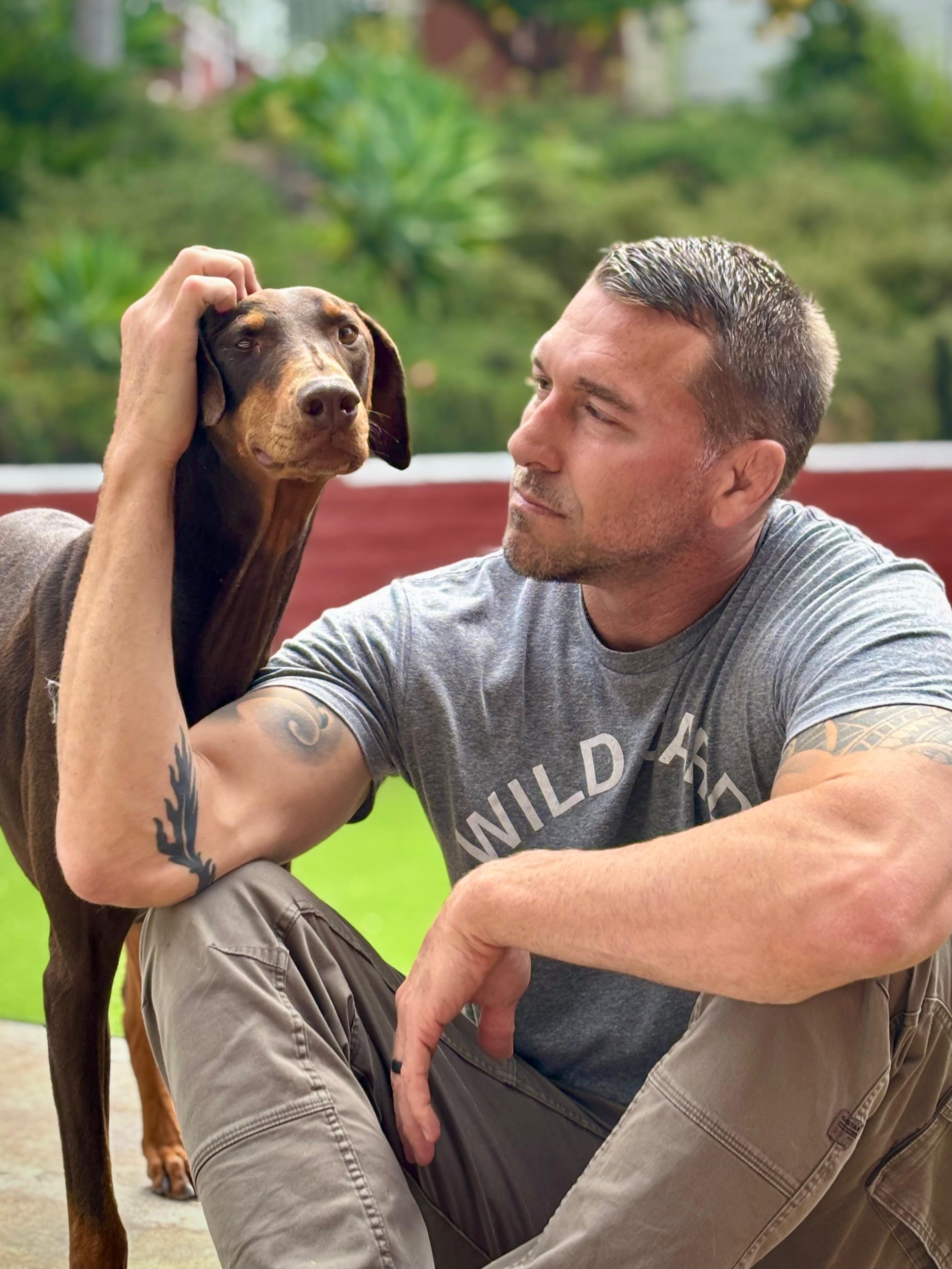 Brandon with Doberman